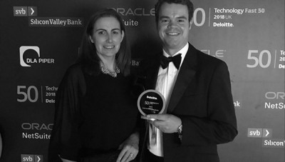 Roger Beadle and Megan Neale of Limitless picking up our Deloitte Technology Fast 50 trophy.