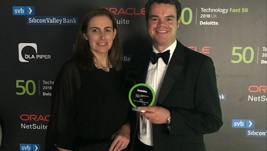 Roger Beadle and Megan Neale of Limitless picking up our Deloitte Technology Fast 50 trophy.